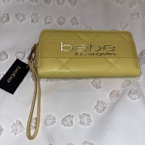 NWT- Bebe yellow clutch /wristlet wallet